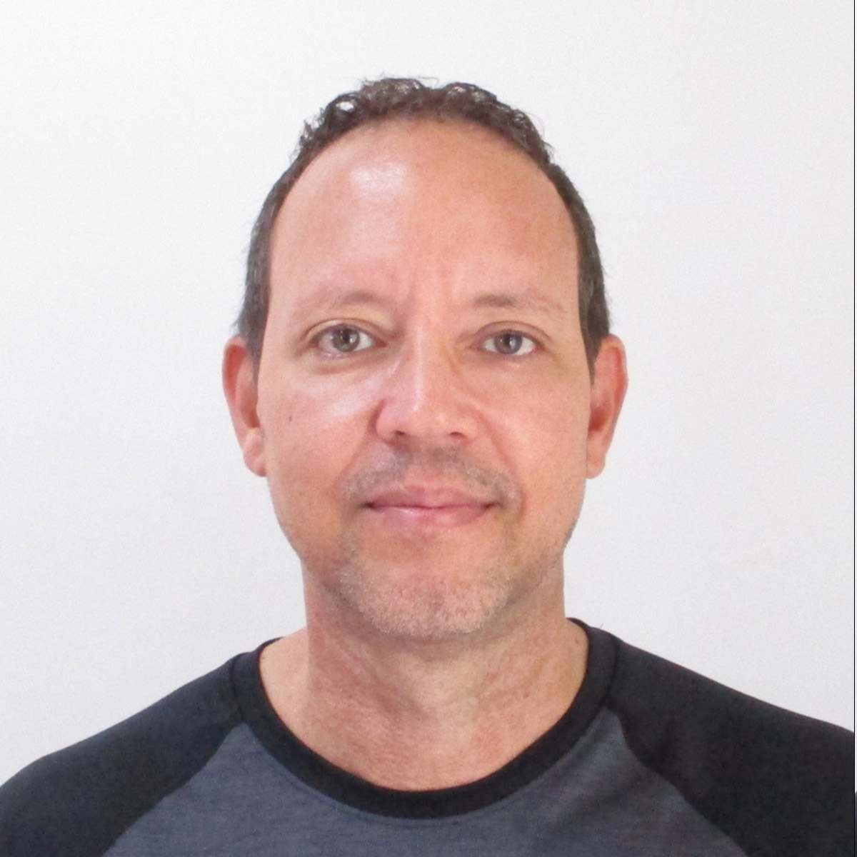 Portrait of Christopher Walker, founder of StartupAI.